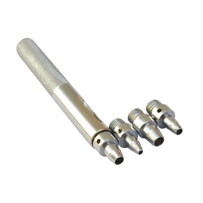 May include: A silver metal punch tool with a handle and three interchangeable tips. The tips are different sizes and have a round hole in the centre.