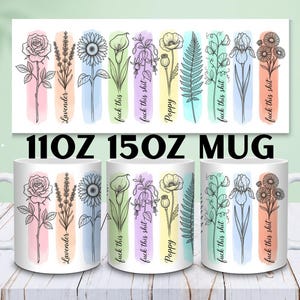 Puede incluir: Una taza de cerámica blanca con ilustraciones botánicas de líneas negras sobre pinceladas de acuarela de colores. El diseño incluye flores, helechos y etiquetas de texto como Lavender, Poppy y la frase fuck this shit.