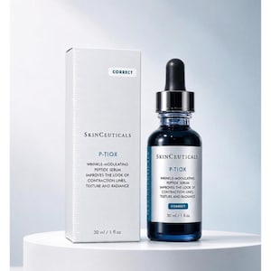 May include: A dark blue glass dropper bottle of SkinCeuticals P-TIOX wrinkle-modulating peptide serum next to its white rectangular box. Both feature the text: P-TIOX, WRINKLE-MODULATING PEPTIDE SERUM, IMPROVES THE LOOK OF CONTRACTION LINES, TEXTURE AND RADIANCE, 30 ml / 1 fl oz.