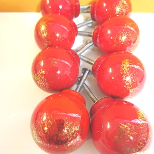 8 round porcelain cabinet knobs, red with gold splatters, dresser knobs, new old stock