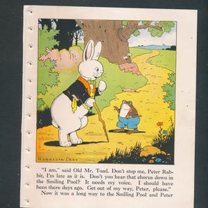 May include: A vintage illustration from a children's book featuring a white rabbit in a black coat and orange vest, holding a walking stick, and a frog in blue pants. The scene is set on a path with trees and text at the bottom.