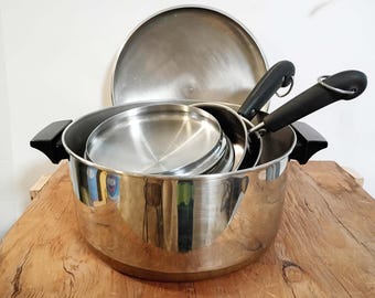 Revere Ware cookware 2 saucepans, 1 stock pot, each with lid