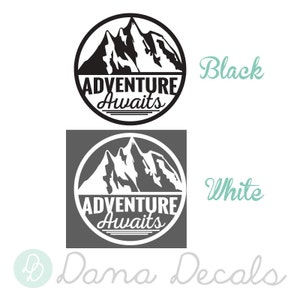 May include: Two circular decals with a mountain range design. One is black on a white background, the other is white on a gray background. The text "ADVENTURE AWAITS" is centered below the mountains.