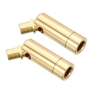 May include: Two gold-colored metal swivel connectors featuring a threaded male end and a cylindrical body with an internal threaded opening. These components are designed with a pivot joint that allows for adjustable positioning of the main barrel.