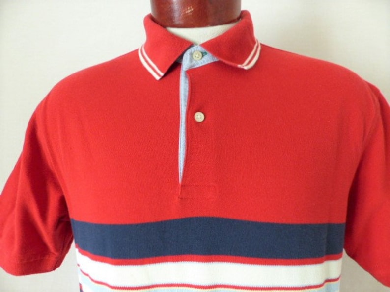 navy blue and yellow tommy hilfiger shirt