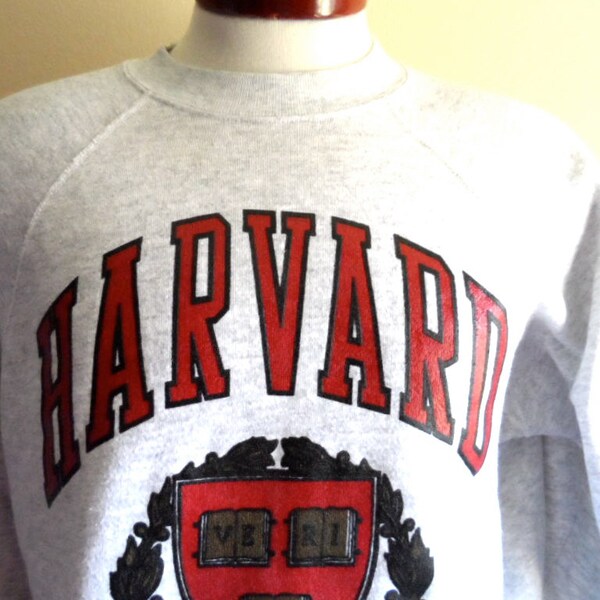 go Crimson rare vintage 80's Harvard University ivy league red veritas logo crest heather grey fleece crew neck graphic sweatshirt tri-blend