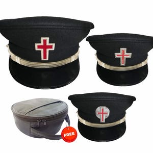 May include: Three black peaked caps with a red cross emblem on the front, featuring a black visor and a light-colored band above the brim. A dark gray circular carrying case with a zipper closure and a red circular tag is included in the set.