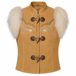 May include: A tan suede vest featuring cream-colored curly fur shoulder accents, a high collar, and three brown toggle closures. The front is decorated with metallic studs and white arrow-shaped embroidery details across the chest area.