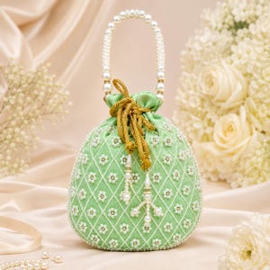 Elegant Mint Green Pearl-Embellished Potli Bag with Beaded Handle, Golden Drawstring and Tassels