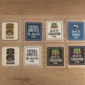 May include: A collection of eleven square stickers featuring FIFA World Cup 2026 branding, Football Unites the World, Unite for Education, and Unite for Peace designs in various color schemes including black, white, gold, blue, and green.