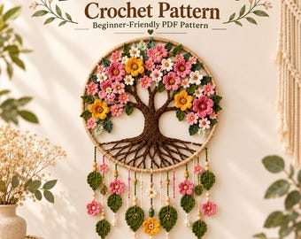 May include: A circular wall hanging featuring a crocheted tree of life with pink, yellow, and white flowers and green leaves. The text "Floral Tree of Life Crochet Pattern" and "Beginner-Friendly PDF Pattern" is displayed above the design.