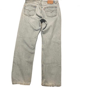 90s Vintage Levis 501 34.50 waist light wash