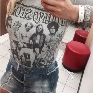 Vintage 90s denim mini skirt with 70s influence by Squeeze size 3/4