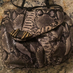 Cartera de piel de serpiente sintética 1980