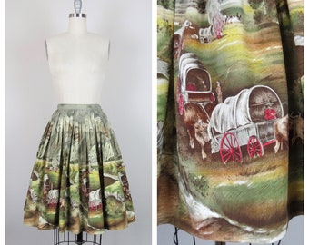 Vintage 1950s novelty print skirt, John Wolf Oregon Trail, cotton, border print, wagon train, old west, size xs