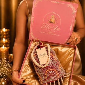 Luxury Ruby Pink Bridal Potli Bag | Handmade Mirror Work Pearl Tassel Purse