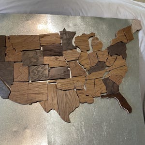 Magnetisches Puzzle, das die unteren 48 Bundesländer zeigt