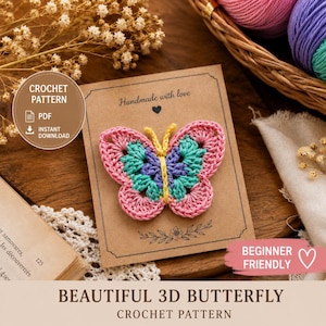 May include: A crochet butterfly applique with pink, teal, and purple yarn wings and a yellow body, attached to a brown card labelled Handmade with love. The card includes text for a crochet pattern, PDF, instant download, and beginner friendly.
