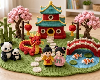 May include: A crochet playset on a green oval mat featuring a red and teal pagoda, a red dragon, two pandas, two figures in traditional clothing, a red bridge over a blue pond with two koi fish, two cherry blossom trees, and bamboo stalks.