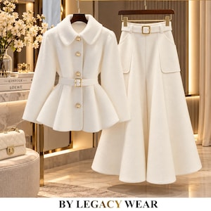 May include: A white two-piece set consisting of a long-sleeved jacket and a high-waisted skirt. The jacket features a collar, gold-toned buttons, and a matching belt. The skirt has a flared silhouette, side pockets, and a belt with a gold buckle.