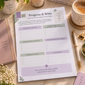 May include: A white paper planner page titled Progress & Wins with sections for tracking weekly accomplishments, small wins, challenges overcome, and gratitude. The layout features soft purple and green accents, checkboxes, and motivational text.
