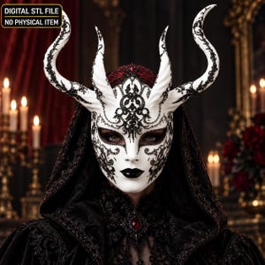 May include: A white mask featuring two large, curved horns and intricate black filigree detailing. The mask includes a digital STL file notice. It is worn with a dark hooded cloak and a red gemstone accent at the neck, creating a dramatic appearance.