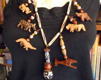 Price reduced, was 104 Africa safari necklace handmade with handcarved African animals, vintage and bone beads unusual