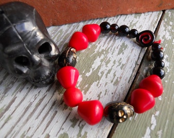 The Real Dia de Los Muertos Cardinal Colors Skull bracelet in University of Louisville colors