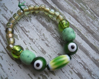 Keep the Evil Eye Away green beaded chunky stretch bracelet