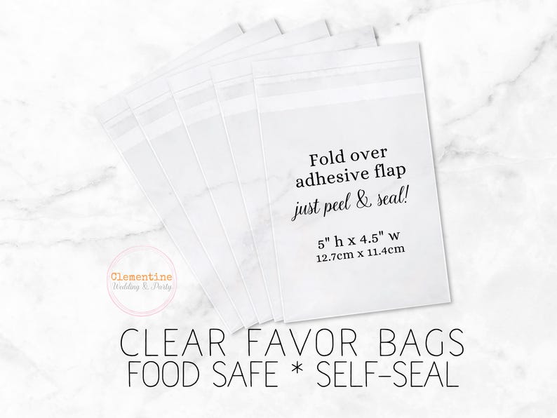 5 clear favor bags are fanned out on a white marble background.  Overlay text:  “CLEAR FAVOR BAGS * FOOD SAFE * SELF SEAL, 5”h x 4.5”w, 12.7cm x 11.4cm. Fold over adhesive flap - just peel and seal!”