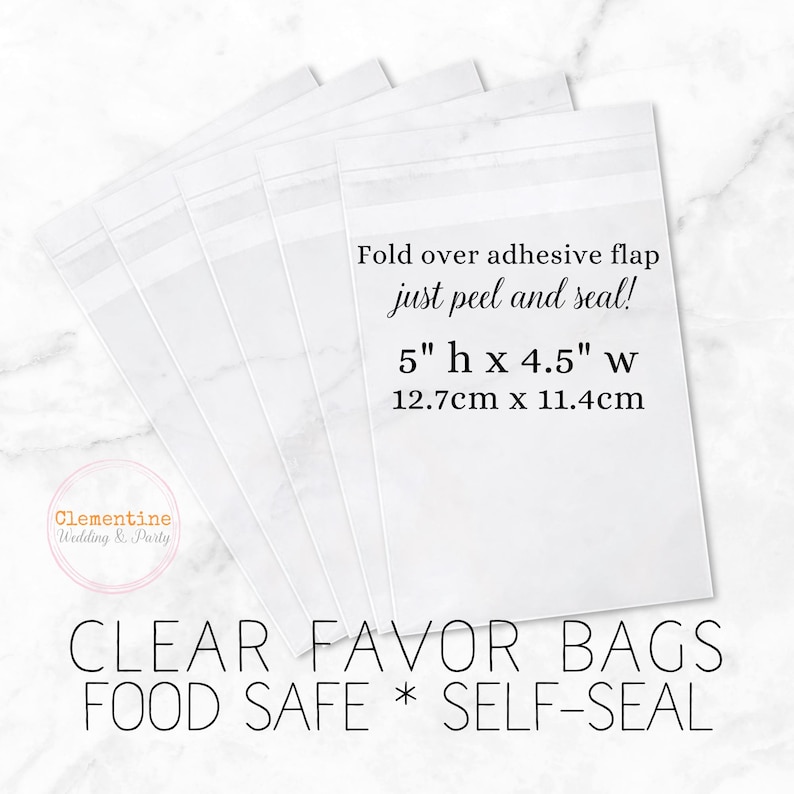 5 clear favor bags are fanned out on a white marble background.  Overlay text:  “CLEAR FAVOR BAGS * FOOD SAFE * SELF SEAL, 5”h x 4.5”w, 12.7cm x 11.4cm. Fold over adhesive flap - just peel and seal!”