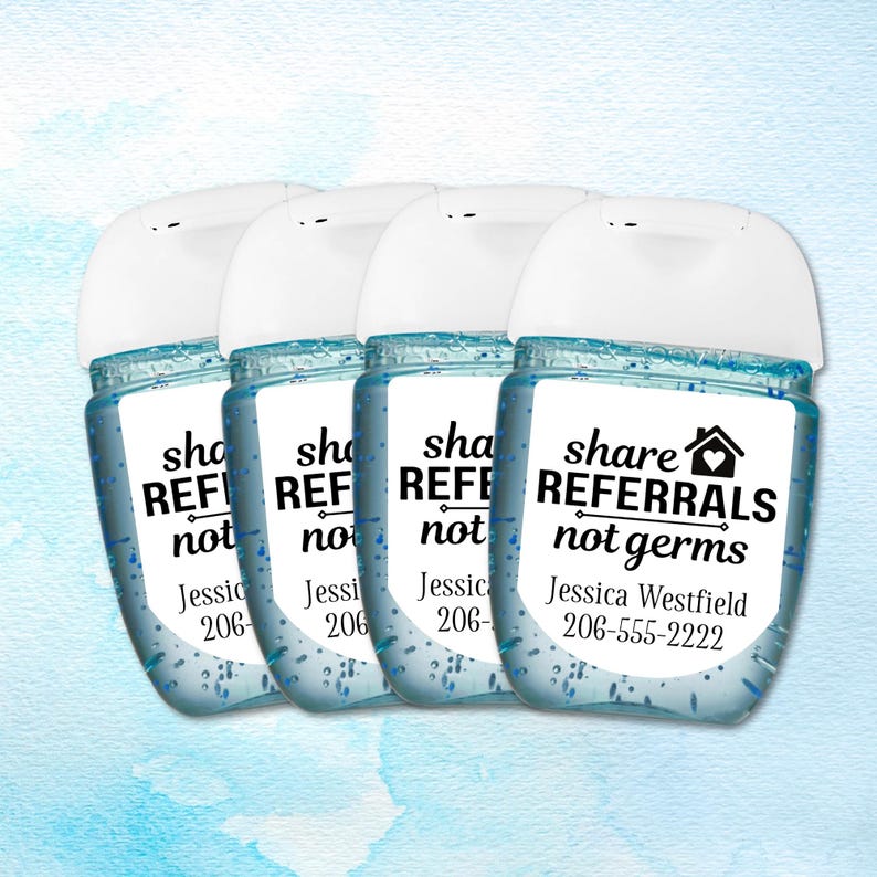 Four clear plastic bottles of hand sanitizer with white labels. The labels have black text that reads "share referrals not germs" and a house icon with a heart inside. The label also includes a name and phone number.