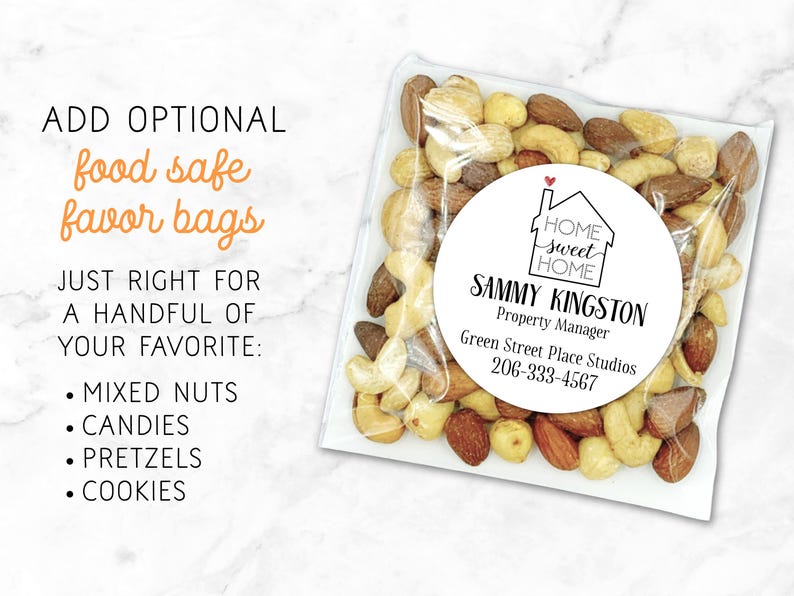 Square clear treat bag shown filled with mixed nuts.  Bag has a round white label attached.  Label design: 'Home Sweet Home' inside a simple house outline, with a small red heart coming out of the chimney.  Labels are personalized at the bottom with professional contact info Name/Title/Company/Phone#/Email.  Overlay text: 'Add optional food safe favor bags - just right for a handful of your favorite mixed nuts, candies, pretzels, cookies.'