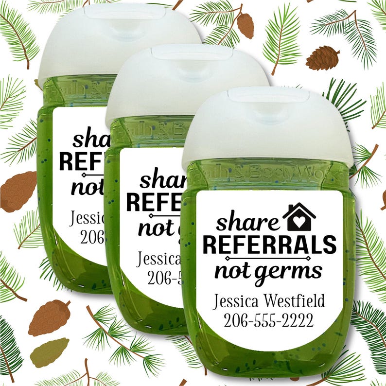 Three green hand sanitizer bottles with white labels. The labels have black text that reads "share referrals not germs". The middle label also has a small house icon with a heart inside. The label has a name and phone number.
