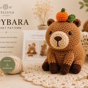 May include: A brown crocheted capybara plush toy with a light beige muzzle, dark brown paws, and a small orange fruit with a green leaf on its head. The text reads VELLUGA STUDIO CAPYBARA CROCHET PATTERN, DETAILED PDF PATTERN, STEP-BY-STEP PHOTOS.