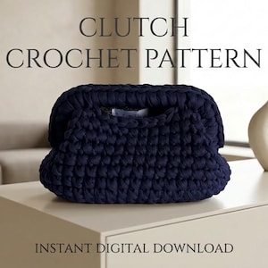 May include: A dark navy blue crochet clutch bag with a thick, textured yarn construction and a rounded frame closure. The text CLUTCH CROCHET PATTERN and INSTANT DIGITAL DOWNLOAD are displayed in dark grey lettering above and below the bag.