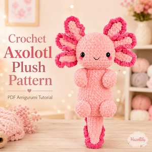 Peut inclure: Une peluche axolotl au crochet rose clair avec des branchies frangées rose foncé, des yeux noirs et un petit sourire. Le texte indique : Crochet Axolotl Plush Pattern, PDF Amigurumi Tutorial et Hazellily. La peluche a un aspect en laine texturée.