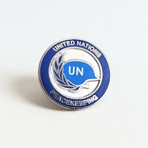 UN Peacekeeping Lapel Pin - Blue Helmet Lapel Pin - Hard enamel, Die Struck Metal Lapel Pin - United Nations Lapel Pin - UN Lapel Pin