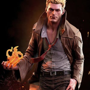 May include: A collectible figurine of a blonde man with a stern expression, wearing a brown trench coat over a light gray shirt and a loose red tie. The figure holds a translucent orange flame in one hand and has a cigarette in the other.