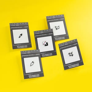 May include: Five rectangular cards featuring digital interface icons on a transparent grid background. Each card displays a unique black graphic: a dropper, a crown, a fountain pen nib, a square with a diagonal line, and a crop tool. Text reads @PINPRICK.SHOP.