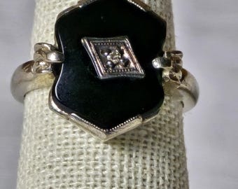 Ring van 10 kt witgoud en onyx