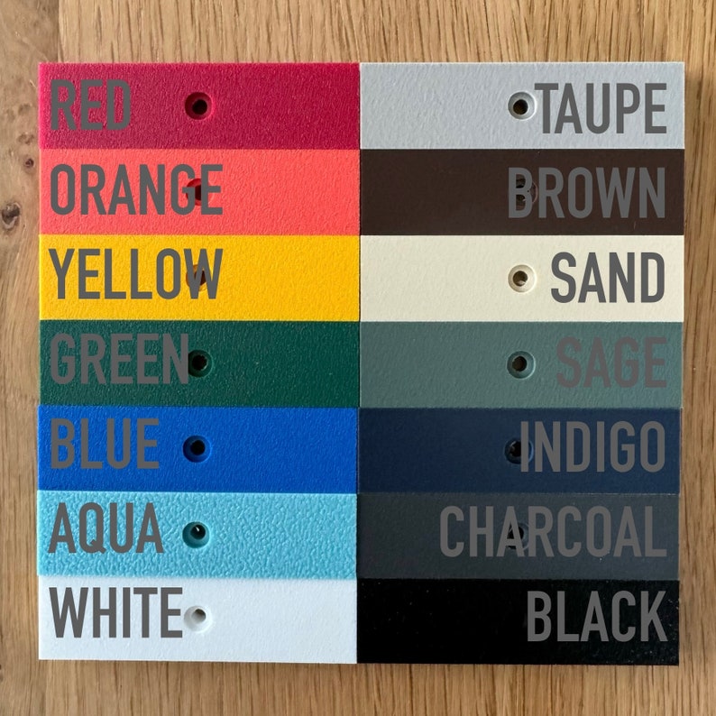 May include: A color chart with 16 different colors, including red, orange, yellow, green, blue, aqua, white, taupe, brown, sand, sage, indigo, charcoal, and black. Each color is labeled with its name.