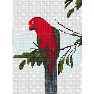 Puede incluir: Un loro rojo y verde posado en una rama con hojas verdes. El loro tiene un cuerpo rojo, alas verdes y una cola gris.