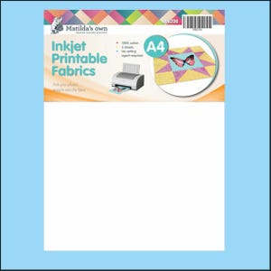 May include: A white pack of "Inkjet Printable Fabrics" by Matilda's Own. The packaging shows a colourful geometric design with a butterfly and a printer graphic. The text includes "100% cotton", "5 sheets", and "A4".