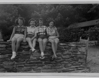 Old Photo Women Siting on Wall Wearing Shorts 1950s Photograph Snapshot Vintage