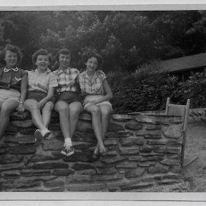 Old Photo Women Siting on Wall Wearing Shorts 1950s Photograph Snapshot Vintage