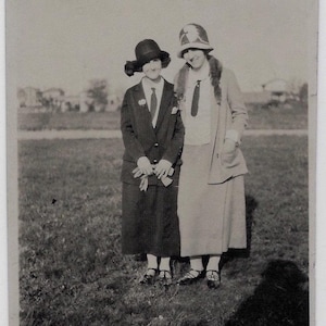 Old Photo 2 Women wearing Jackets Skirts Cloche Hats Photographers Shadow on Field 1920s Photograph Snapshot vintage