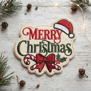 May include: An embroidered patch with a cream-colored background featuring the red text Merry and green text Christmas. The design includes a red and white Santa hat, a red bow, and a red and white candy cane with green holly leaves.