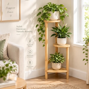 May include: A three-tiered corner plant stand made of light-colored bamboo. The stand features three triangular shelves holding potted green plants. Text on the wall reads: A Happier Home, Stylish. Functional. Naturally Beautiful. Eco-Friendly Bamboo.