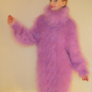 May include: A long, fuzzy, lavender-colored sweater with a turtleneck.
